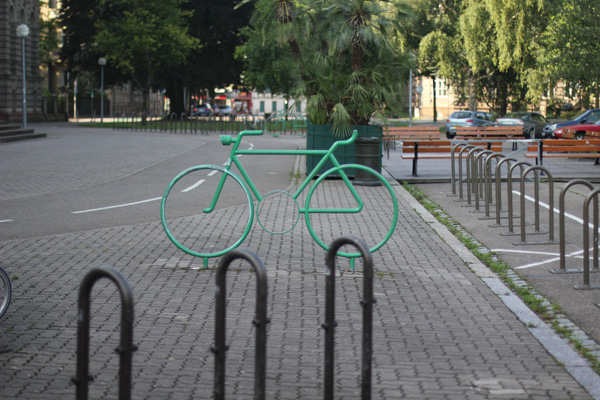 Bicycle racks are placed ideally next to a cycle track.