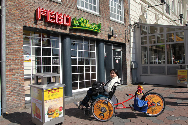 Nellie on a wheel-chair bike at FEBO