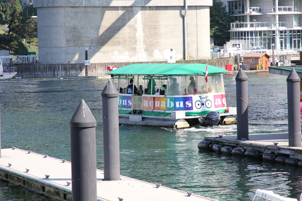 An Aquabus ferry that accepts bicycles. Look for that big bicycle sign.