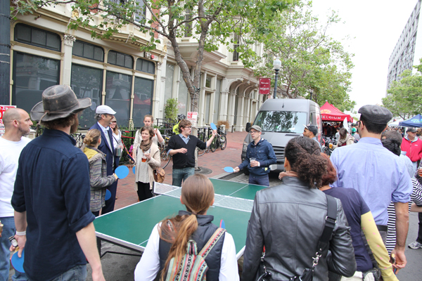 Too many people want to play ping pong, so everyone got a paddle and get to hit the ball one at a time.  LOL!