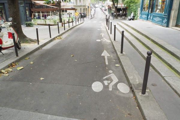 Many narrow one-way streets have contra-flow bike lanes.
