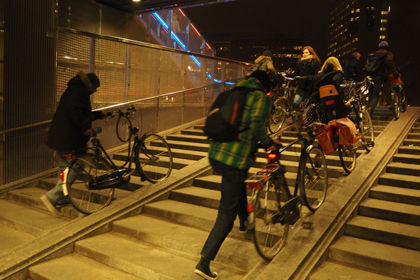 Bike ramps at a bike parking garage in Utrecht. Note the easiness of pushing bikes up and down the stairs.